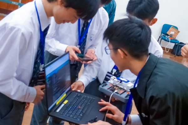 Students competing during the robotics challenge session