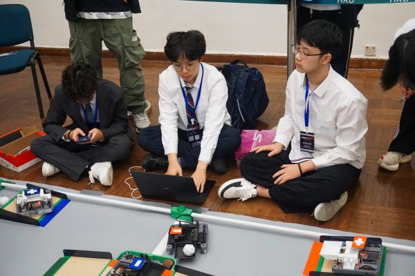 Students competing during the robotics challenge session(1)